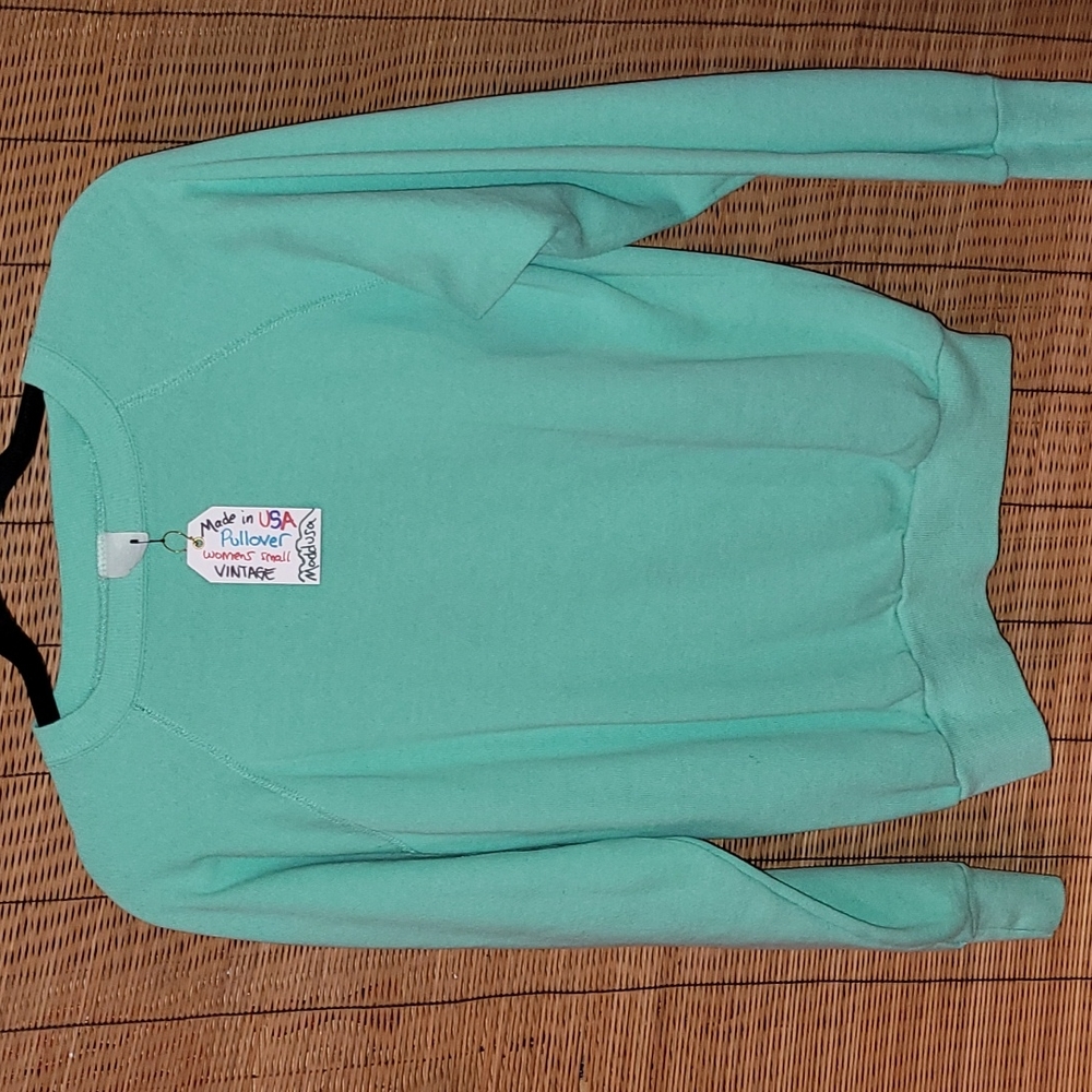 Vintage.  Made in USA. Women's pullover crew sweater. Size Large.